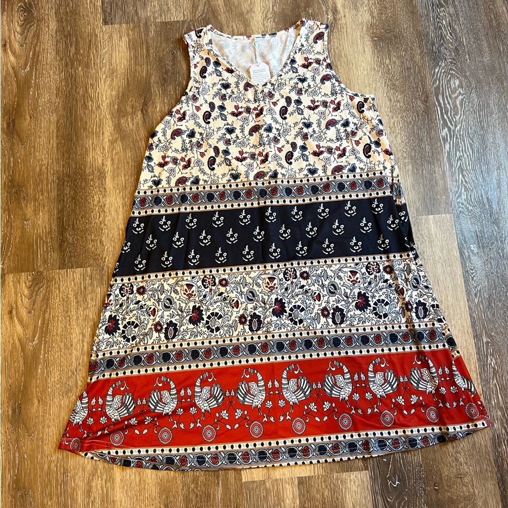 Cute sleeveless, v neck print dress size LARGE,
